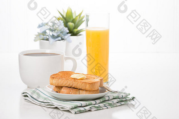 烤面包黄油服务新鲜的咖啡橙色汁