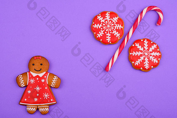 圣诞节自制的姜饼饼干明亮的彩色的背景一年折扣出售