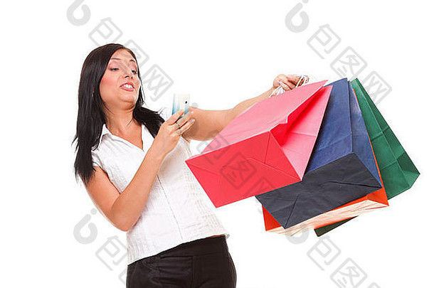 肖像可爱的年轻的女人说话移动持有购物袋白色背景