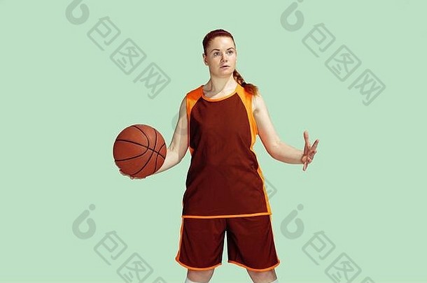 年轻的高加索人女<strong>篮球</strong>球员行动运动游戏孤立的薄荷彩色的背景概念体育运动运动能源动态健康的生活方式<strong>培训</strong>练习