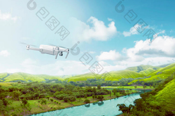 白色无人机相机飞行绿色山河树蓝色的天空背景