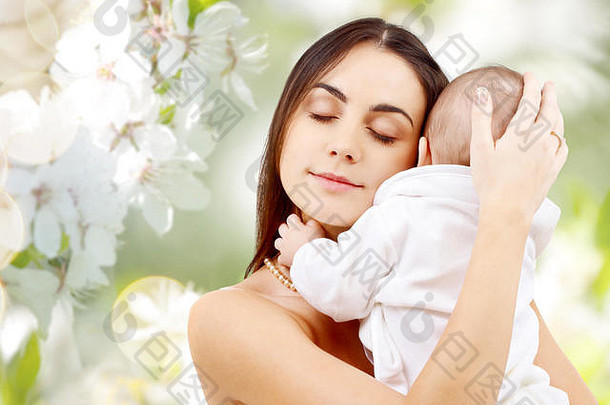 妈妈。婴儿樱桃开花背景