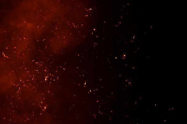 烟火余烬粒子纹理覆盖燃烧效果孤立的黑色的背景