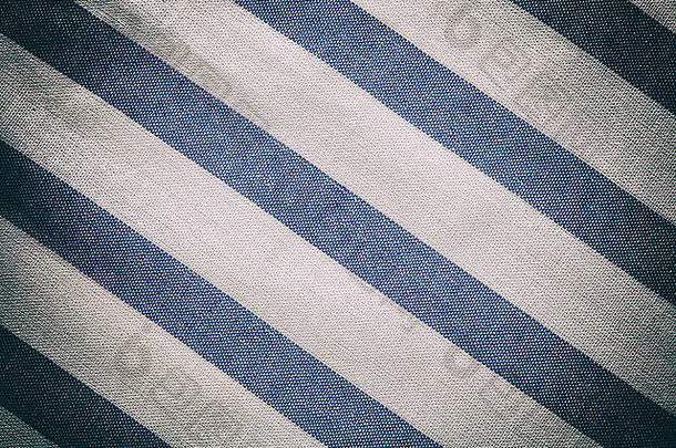 蓝色的白色古董纹理织物棉花背景棉花纺织桌布条格平布古董效果