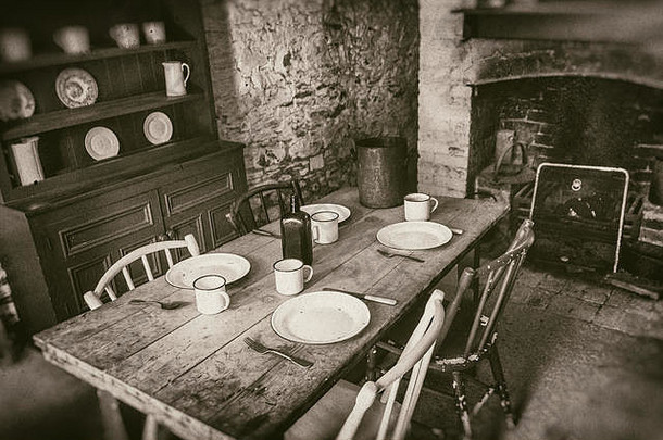 可怜的农民室内世纪餐厅房间集木表格壁炉乌贼风格摄影