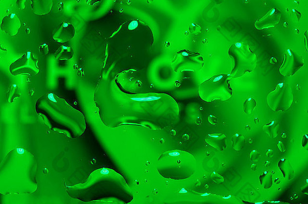 绿色抽象背景，玻璃上有水滴作为背景或背景