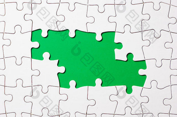 拼图谜题游戏一块绿色背景业务主题设计