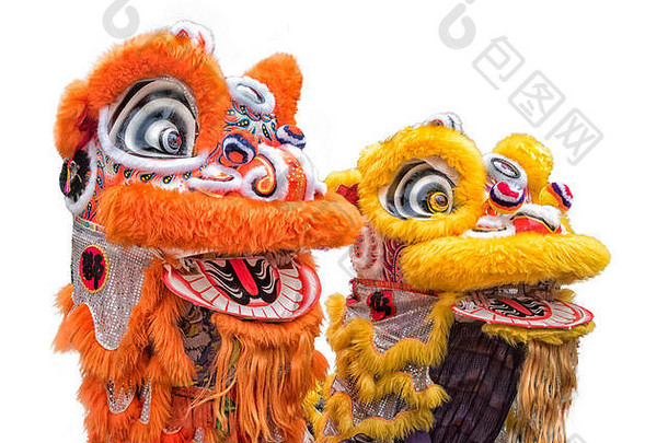 橙色和黄色流苏的彩色中国新年服装特写。写作说新年快乐