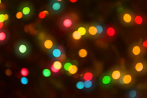 抽象圆形灯光模糊了波基假日背景的圣诞灯