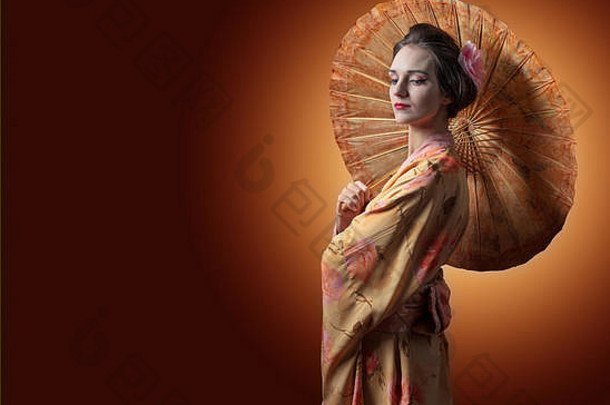 年轻的美丽的女人传统的日本和服伞完美的头发化妆免费的空间内容