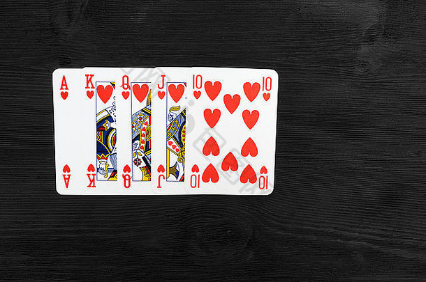 玩卡片孤立的黑色的背景皇家冲洗