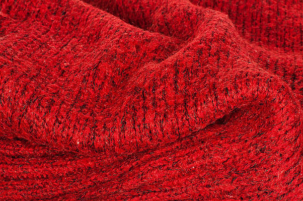 手工制作的针织红色的背景关闭结构纱