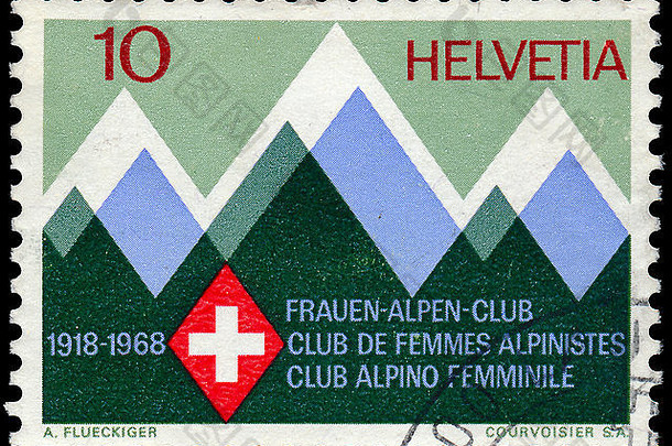 瑞士——大约1968年：在瑞士印刷的一枚邮票上显示了山脉和瑞士女子阿尔卑斯俱乐部的标志，公元50年