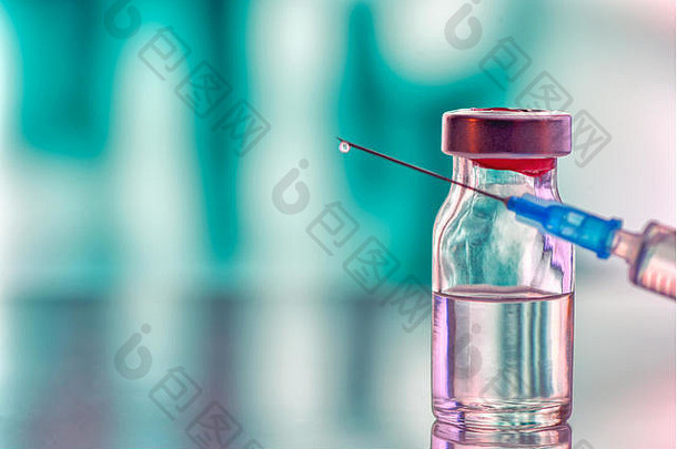 特写镜头医学瓶流感麻疹疫苗瓶注射器针免疫接种古董医疗背景医学药物浓缩的
