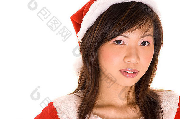 可爱的年轻的亚洲女人圣诞老人服装