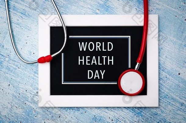 <strong>世界卫生日</strong>，医疗保健和医疗概念，红色听诊器和相框