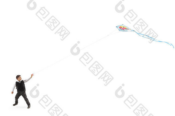 完整的长度配置文件拍摄小学生飞行风筝孤立的白色背景