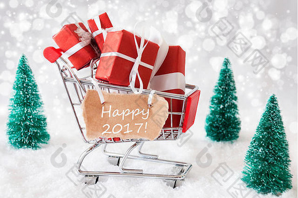 带圣诞礼物和雪花的手推车，2017年快乐短信