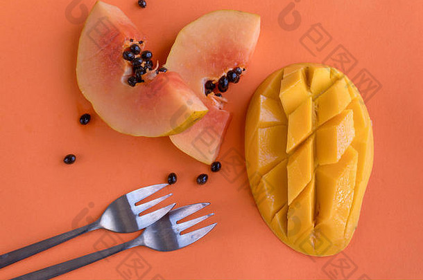 木瓜芒果橙色背景健康的有机水果完美的零食完整的维生素抗氧化剂健康的生活方式