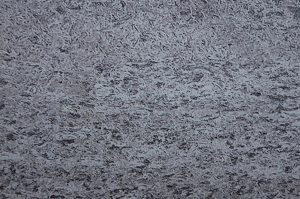灰色的烟雾缭绕的大理石抛光表面自然石头特写镜头背景纹理