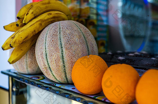 夏天的水果。甜瓜、香蕉、橘子特写微距摄影