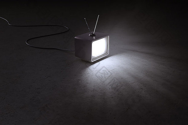 一台装在空旷黑暗室内的复古电视机