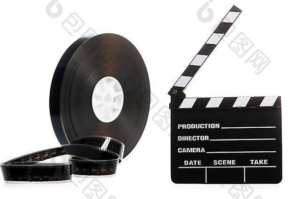 一个黑色的电影盒式卷轴和一个电影院的<strong>拍手声</strong>被隔离在白色的屏幕上