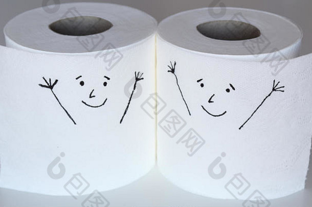 两张白色的卫生纸卷，两张欢快的脸贴在一起，代表着幸福的感觉