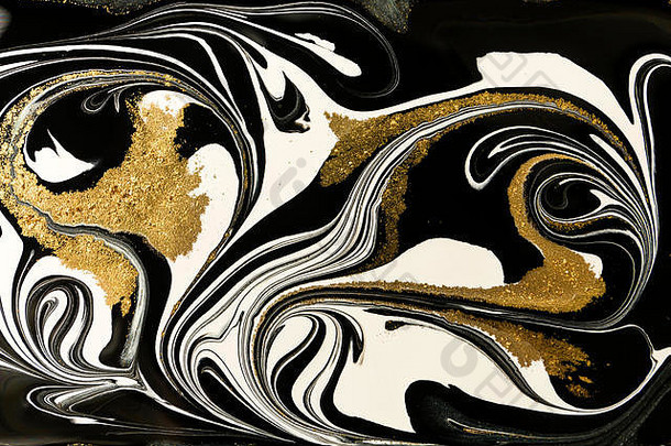 金色大理石花纹纹理设计。黑色和金色大理石图案。流体艺术。