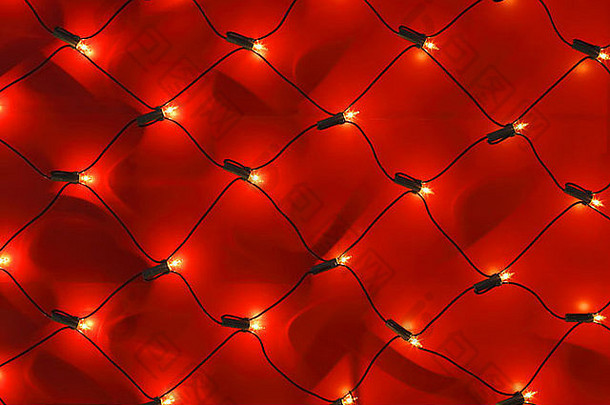 细节红色的墙圣诞节灯网
