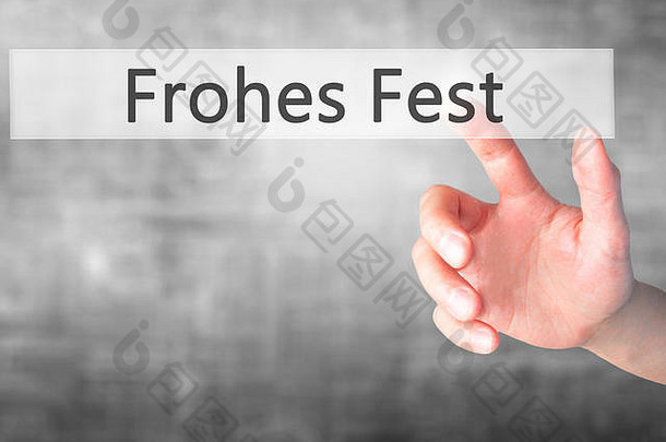 frohes fest（德语为“圣诞快乐”）-在模糊的背景上手动按下按钮。商业、技术、互联网概念。库存照片
