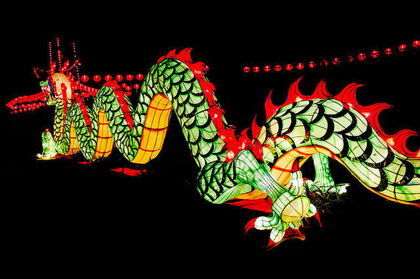中国人一年装饰,特写色彩斑斓的龙闪闪发光的散景回来背景软模糊