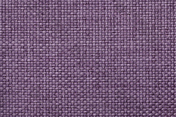 浅紫色背景，编织方格图案，特写。织物的纹理，宏观。