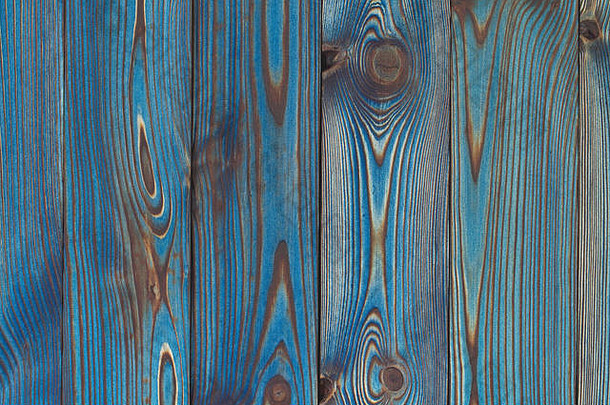 蓝色木制桌子背景。乡村蓝木桌子的特写镜头