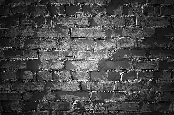 黑色砖墙，带<strong>点光源</strong>，正面平坦，背景纹理细致