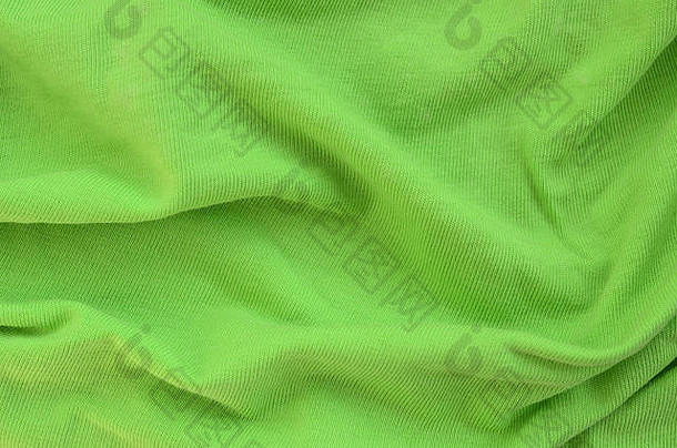 纹理织物明亮的绿色材料使衬衫衬衫