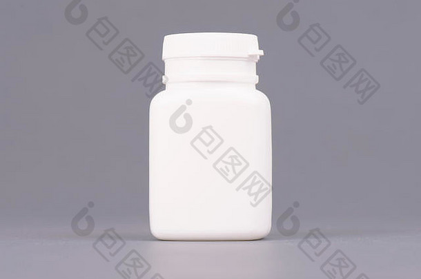 空白大大小医学白色塑料包装瓶化妆品维生素药片胶囊包装灰色的背景