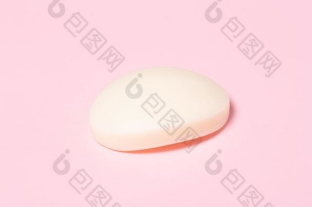 白色酒吧肥皂粉红色的背景hugiene概念