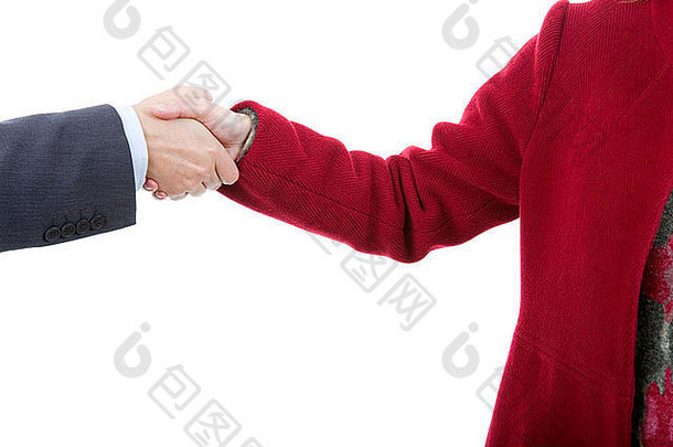 一对商务夫妇隔着一张白纸握手