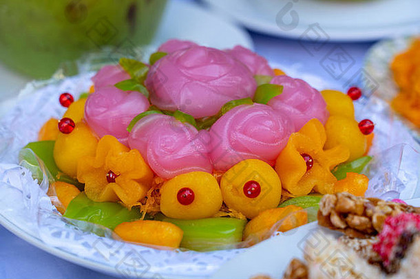 泰国甜蛋糕。泰国传统甜点，粉红色玫瑰花形。泰国九大吉祥甜点之一。来自Khanom的玫瑰形状