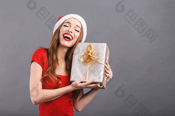 兴奋圣诞节女人穿圣诞老人他红色的衣服笑享受礼物一年圣诞节假期记忆礼物购物折扣商店雪少女圣诞老人老人化妆发型狂欢节