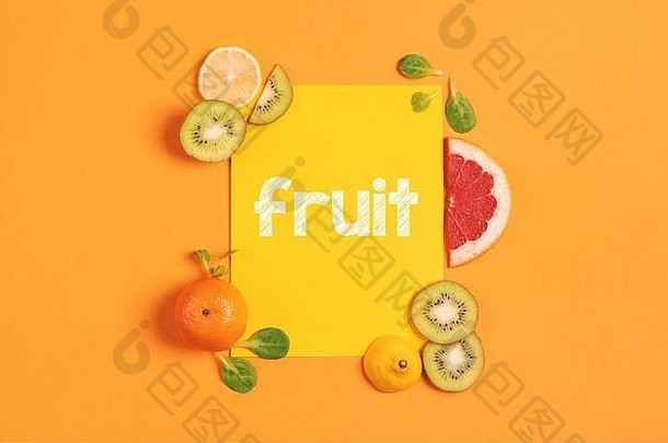 作文柑橘类水果橙色柠檬猕猴桃黄色的背景