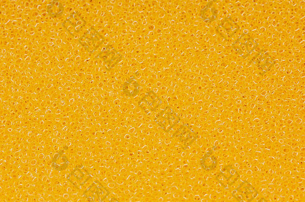 图像黄色的海绵表面背景