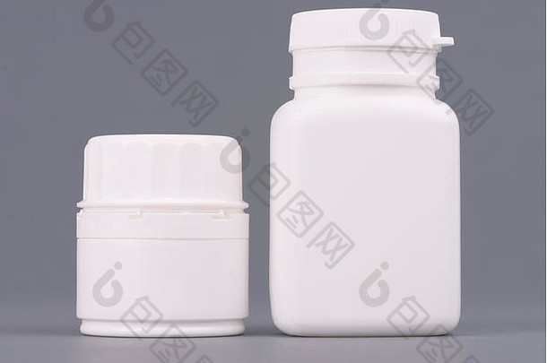 空白大媒介大小医学白色塑料包装瓶<strong>化妆品</strong>维生素药片胶囊包装灰色的背景