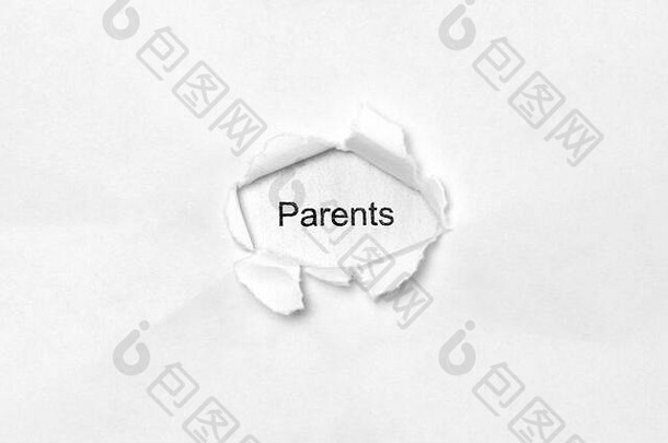 字父母在白色孤立的背景下，题字通过纸上的伤口孔。为web存储照片，并在空白处打印文本