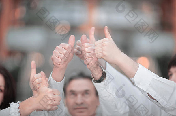 特写镜头专业业务团队业务团队提高拇指