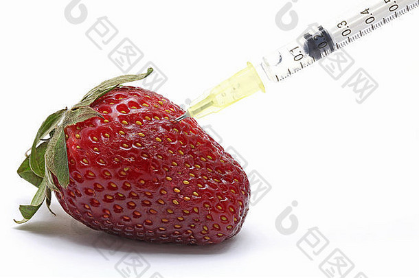 草莓和注射器的基因食品工程概念