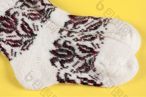 袜子针织羊毛暖白案装饰服装针线编织。背景黄无人过冬