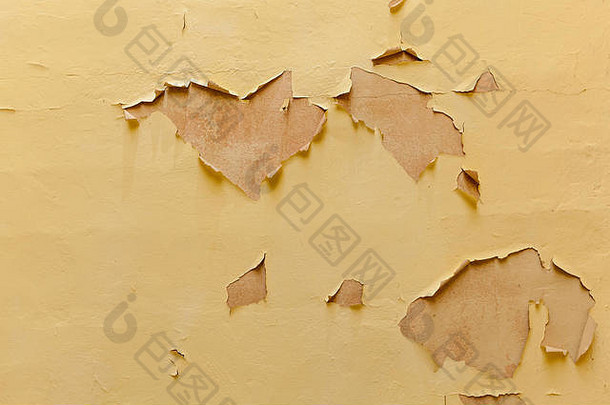 破旧的墙摘要纹理黄色的画破旧的墙关闭