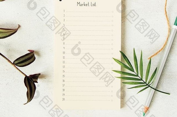 笔记本铅笔植物白色背景工作室拍摄色彩斑斓的文具的事情配件市场营销照片业务网络